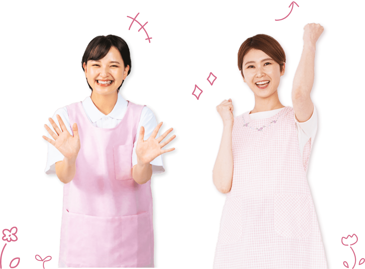 笑顔でポーズをする女性保育士2人